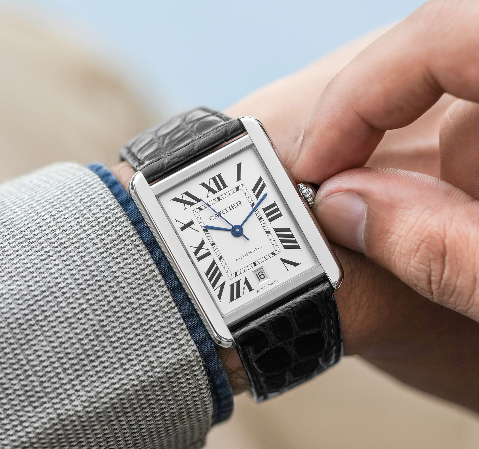 Cartier tank price hot sale