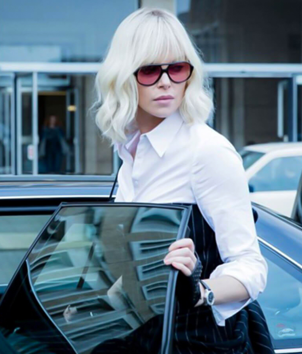 Charlize Theron  wearing a Carl F. Bucher watch 