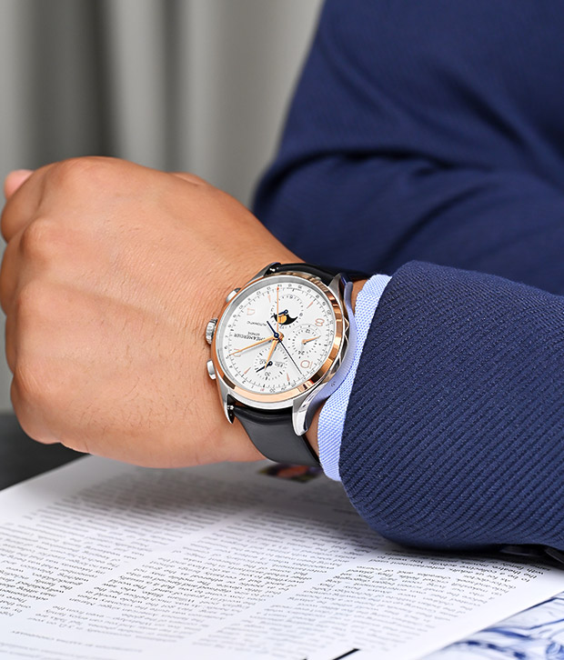 Baume & Mercier Clifton watch with a black strap